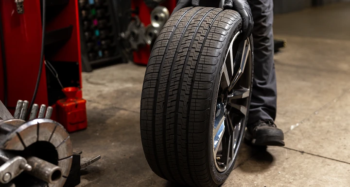 tire by a man's foot